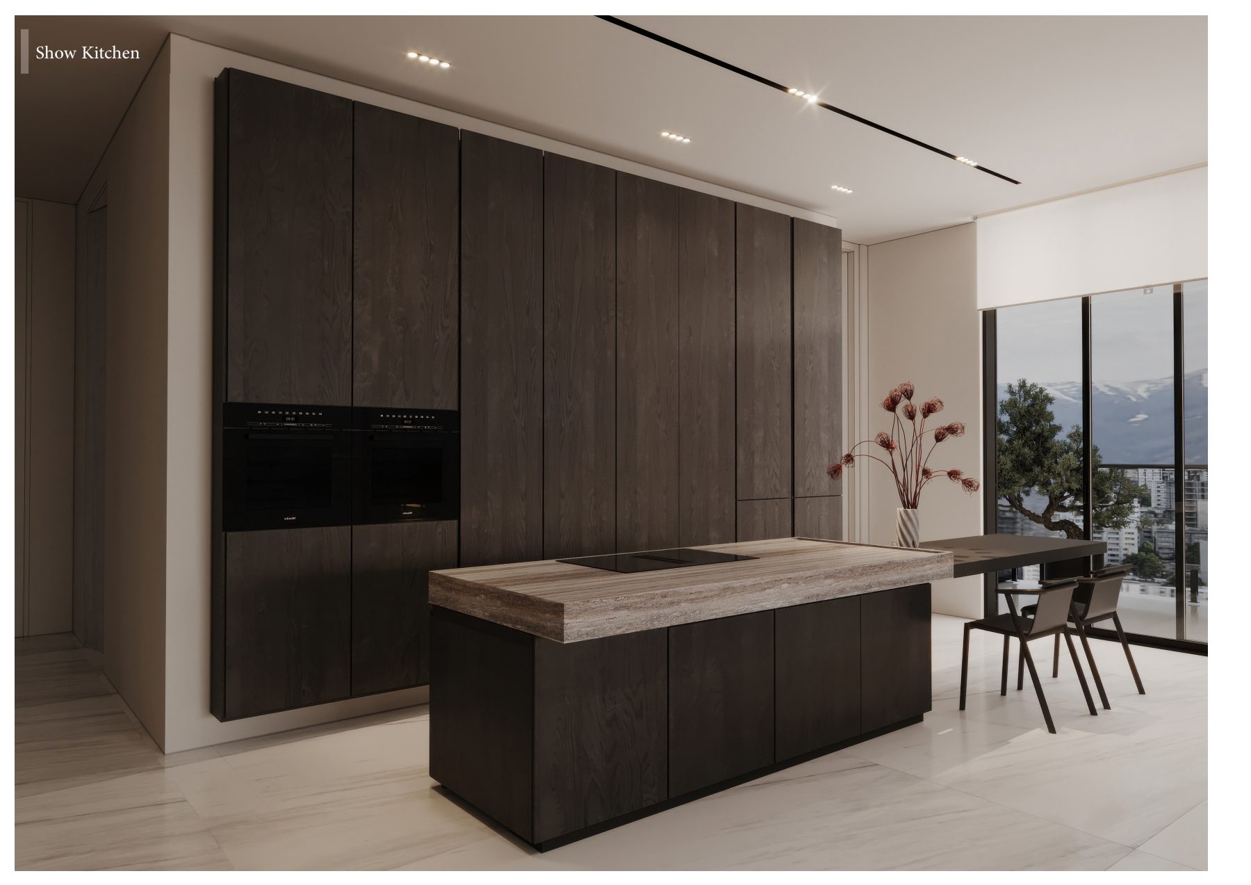 Angled view of a stone kitchen island and a dark timber wall of cabinets.
